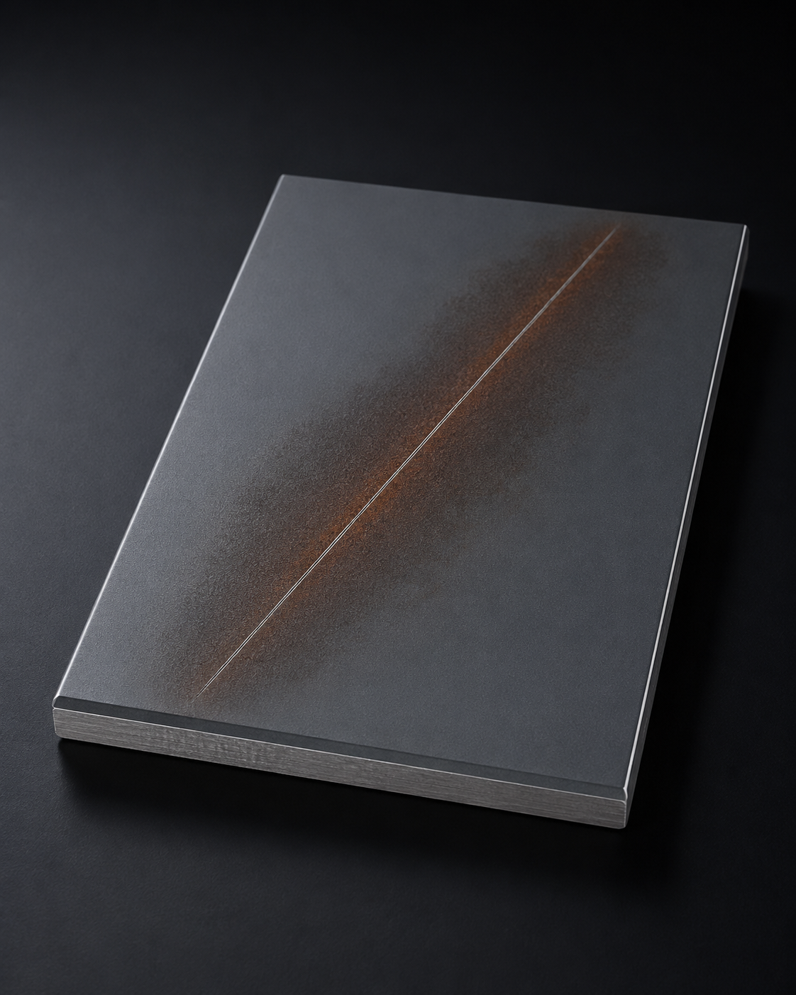 Coated test coupon with a diagonal scribe line and rust-coloured corrosion creep spreading along the scribe.